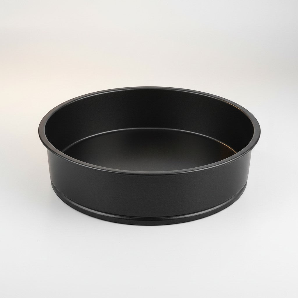 Tap2Own 9-inch round black nonstick cake pan made of heavy-duty steel for even heating and easy release.