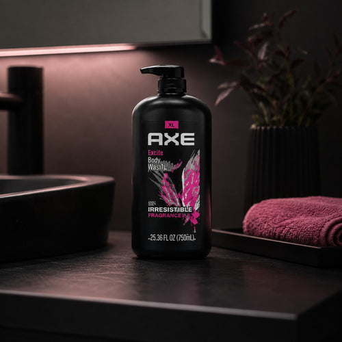 Tap2Own AXE Excite 3-in-1 body, face, and hair wash in a large black pump bottle on a dark bathroom counter.