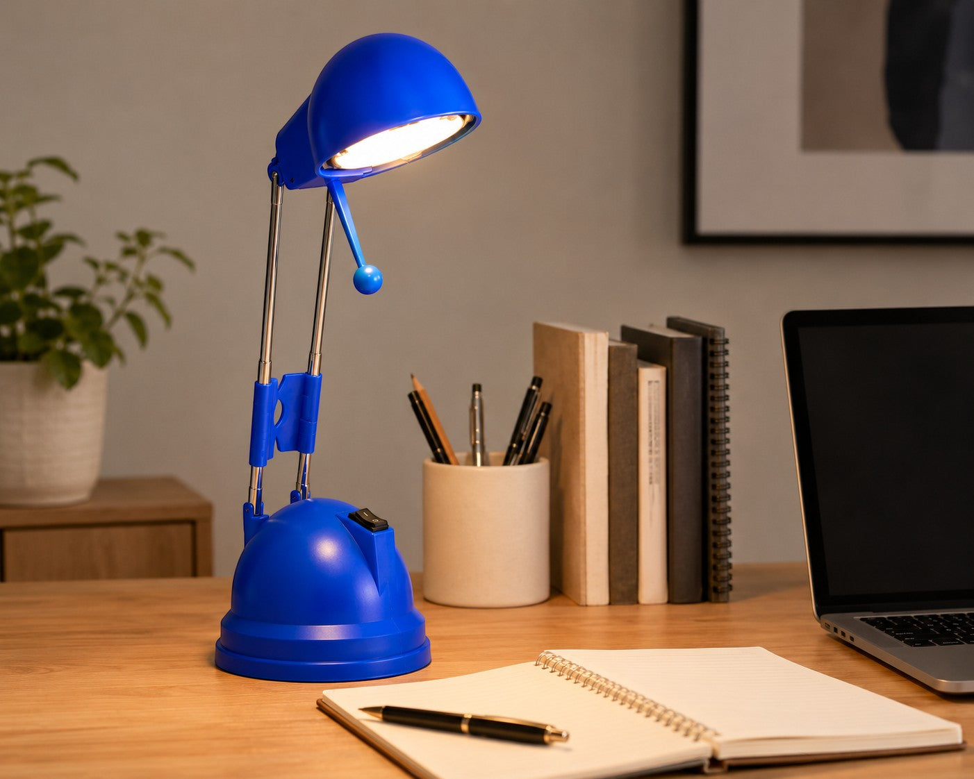 Tap2Own blue adjustable desk lamp with focused light, ideal for study and reading. Modern design with stable base.