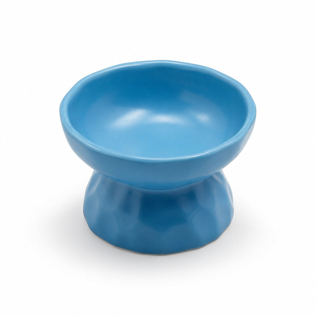Tap2Own blue ceramic pet food bowl with raised base for healthier eating posture. Durable and easy to clean.