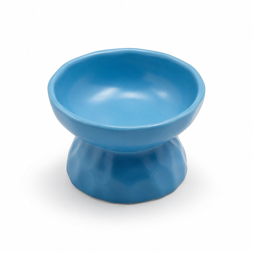 Tap2Own blue ceramic pet food bowl with raised base for healthier eating posture. Durable and easy to clean.