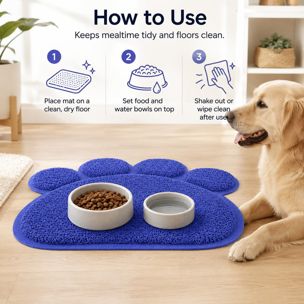 Tap2Own blue paw-shaped pet feeding mat with textured surface, holding food and water bowls. Golden Retriever dog nearby.
