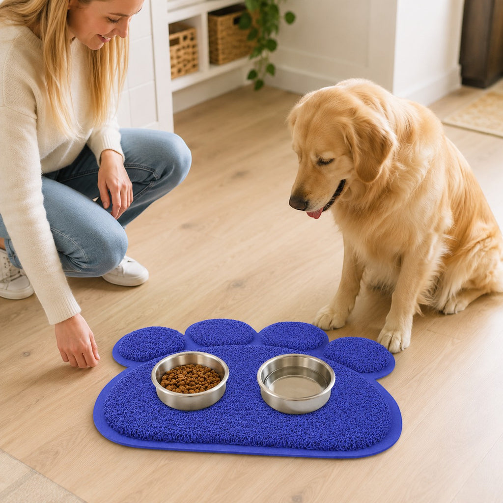 Tap2Own blue paw-shaped pet feeding mat with textured surface for food and water bowls, keeping floors clean.