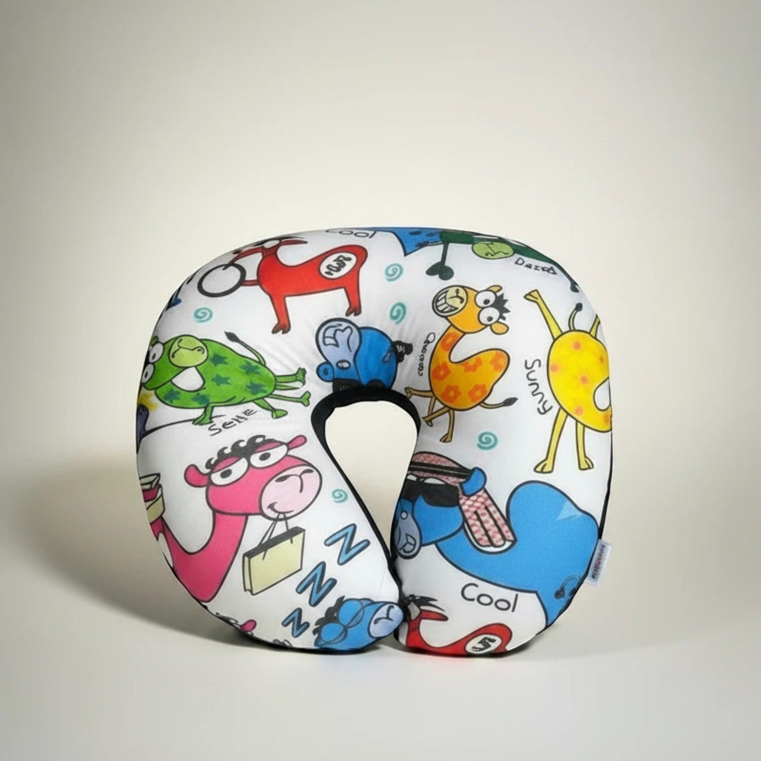 Tap2Own cartoon character travel neck pillow with playful animals and "Cool" text, U-shaped plush design for kids.