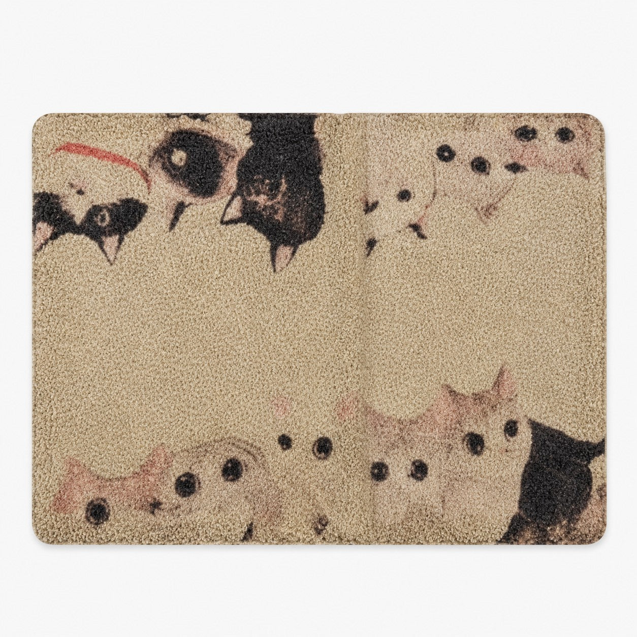 Tap2Own beige textured cat litter trapping doormat with a cute cat face pattern. Durable and easy to clean.