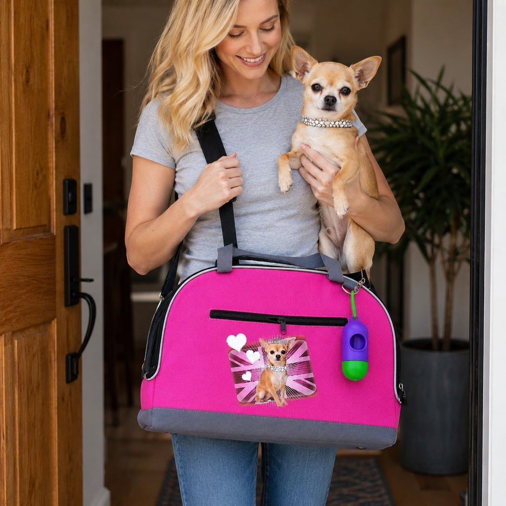 Tap2Own pink pet carrier bag with chihuahua graphic, hearts, and Union Jack design. Features zippered pocket and waste bag dispenser.