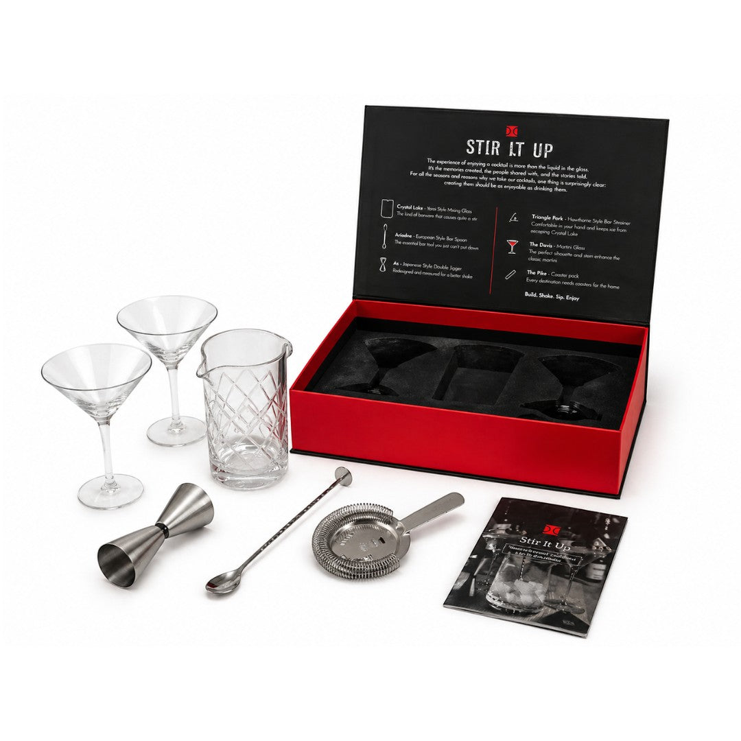 Tap2Own premium cocktail mixing set with crystal glasses, jigger, bar spoon, strainer, and recipe booklet.