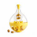 Tap2Own ColPet yellow and clear interactive treat dispensing pet toy with treats inside and outside.