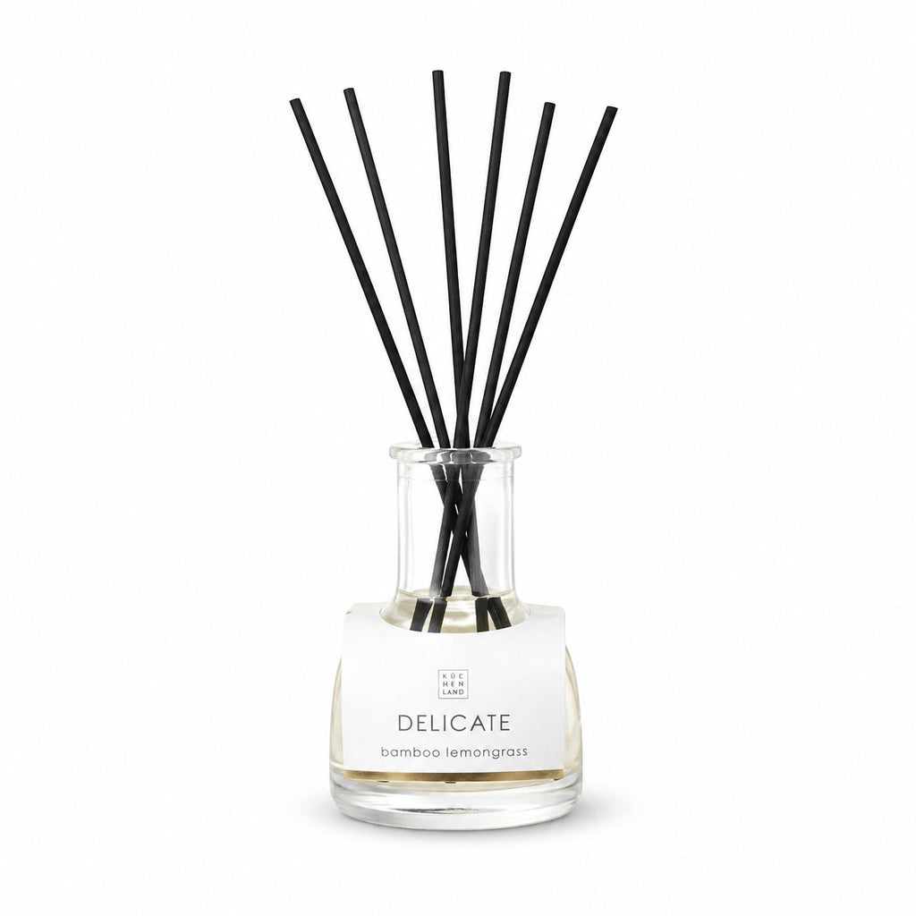 Tap2Own Delicate Bamboo Lemongrass perfume diffuser with black reeds in a clear glass bottle, 200ml.