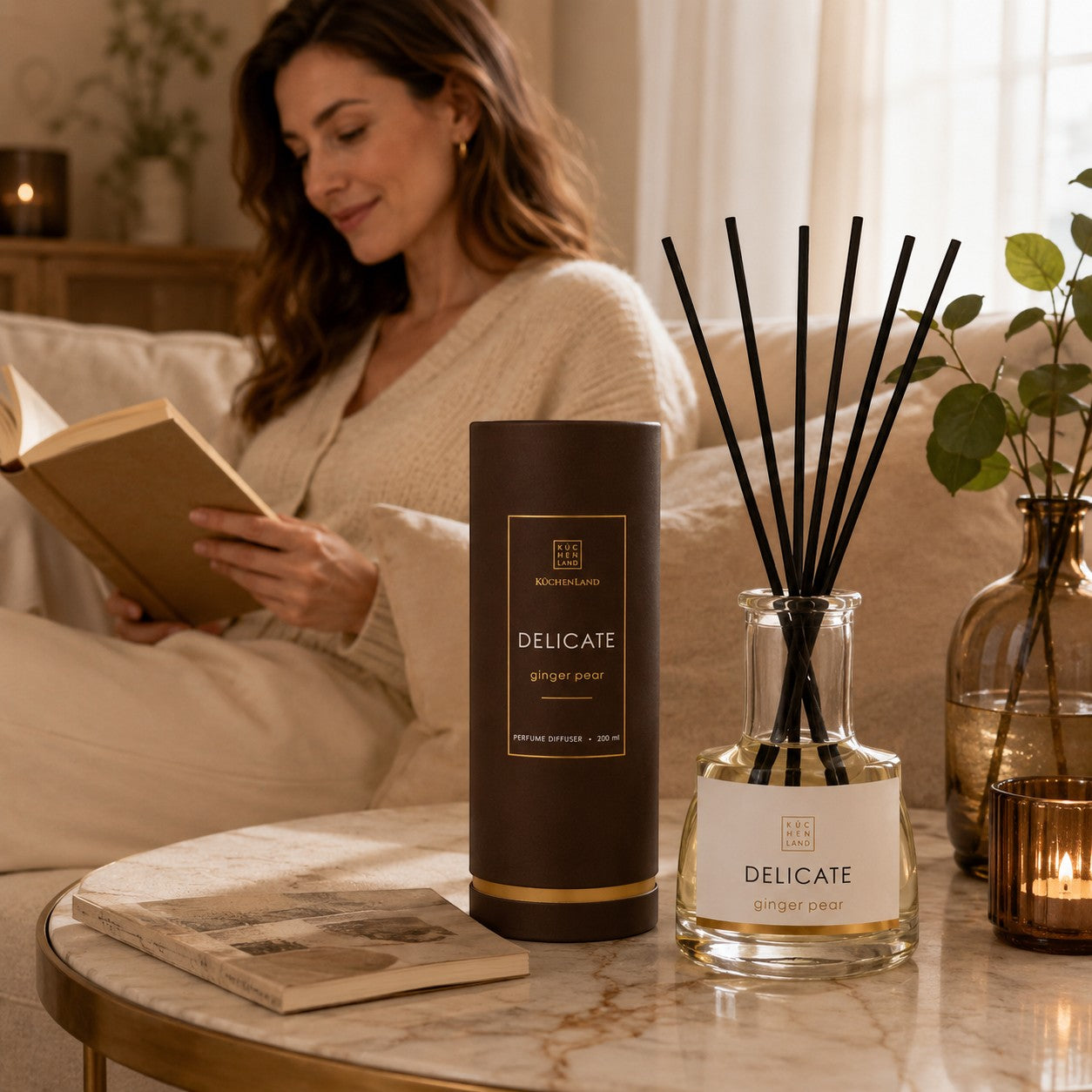 Tap2Own Delicate Perfume Diffuser in Ginger Pear scent, featuring a clear glass bottle with black reeds and a brown cylindrical box.
