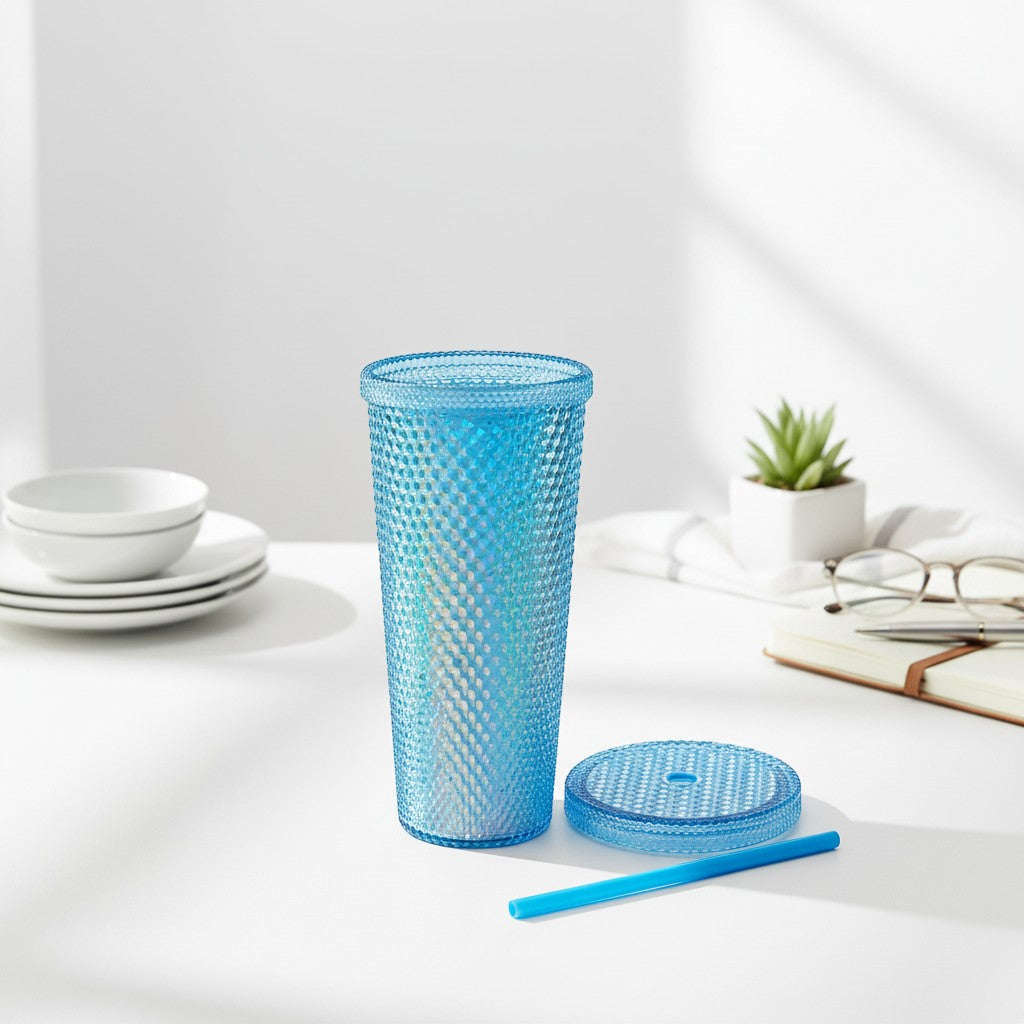 Tap2Own blue diamond studded plastic tumbler with straw and lid. Textured design for grip.
