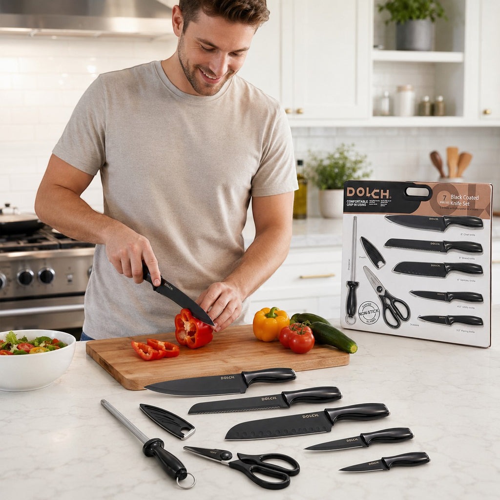 Tap2Own DOLCH 7 Piece Black Coated Knife Set with sharpener and sheath. Man chopping pepper.