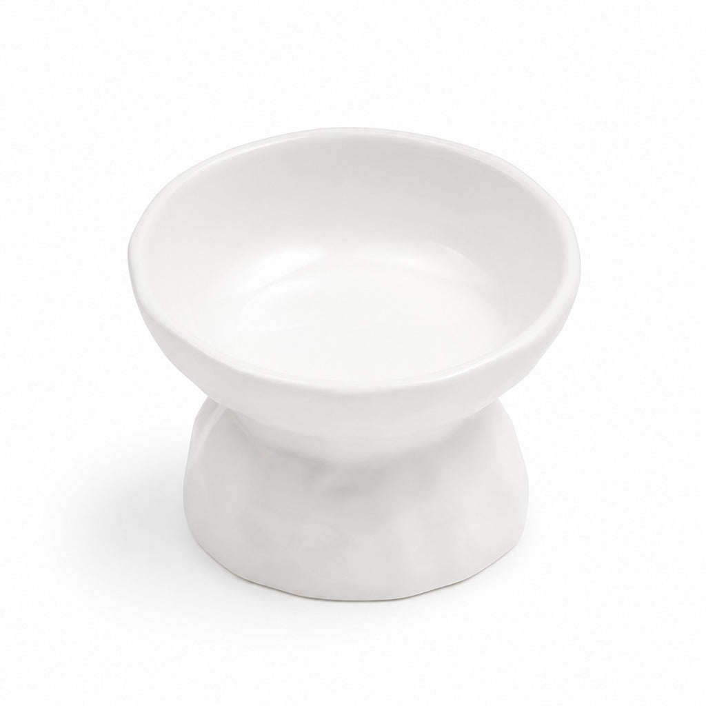 Tap2Own white ceramic elevated pet food bowl for dogs and cats, promoting healthier eating posture.