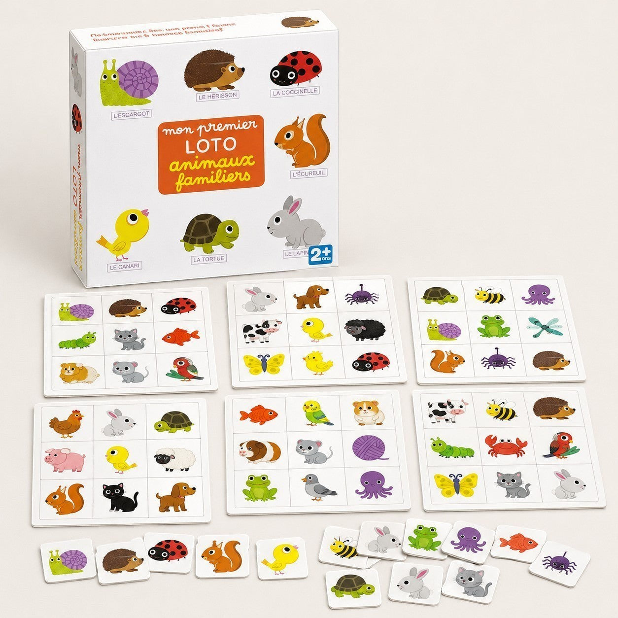 Tap2Own Family Animals Loto Game box with illustrations of snail, hedgehog, ladybug, squirrel, chick, turtle, rabbit. Game boards with animal illustrations.
