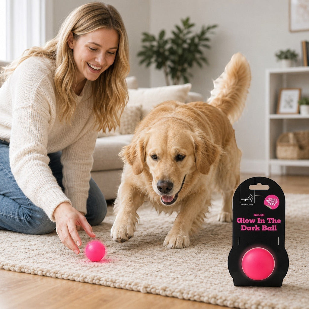 Tap2Own MyPets interactive small neon pink glow-in-the-dark dog ball for fetch and play.