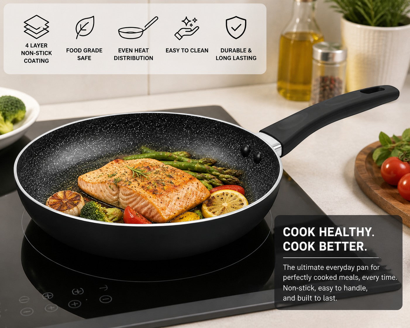Tap2Own Granito 20cm black non-stick induction fry pan with soft-touch handle cooking salmon and vegetables.