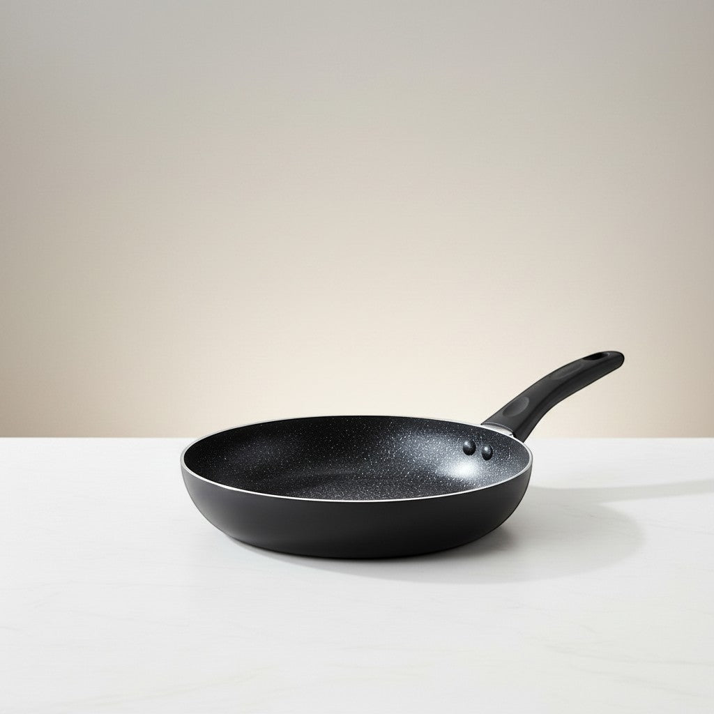Tap2Own Granito 20cm black non-stick induction fry pan with soft-touch Bakelite handle.