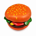 Tap2Own Hamburger Dog Toy, a squeaky chew toy designed to look like a hamburger with orange bun, yellow seeds, green lettuce, red tomato, and brown patty.
