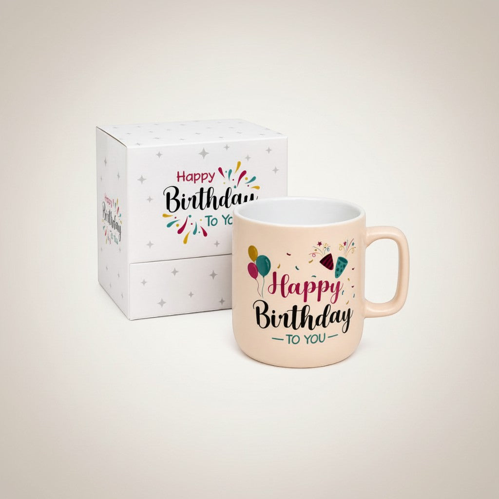 Tap2Own peach ceramic mug with "Happy Birthday To You" text and festive balloon design, includes matching gift box.