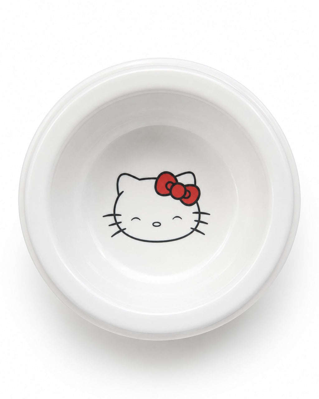 Tap2Own white ceramic cat bowl with Hello Kitty face and red bow detail. Features a playful heart pattern.