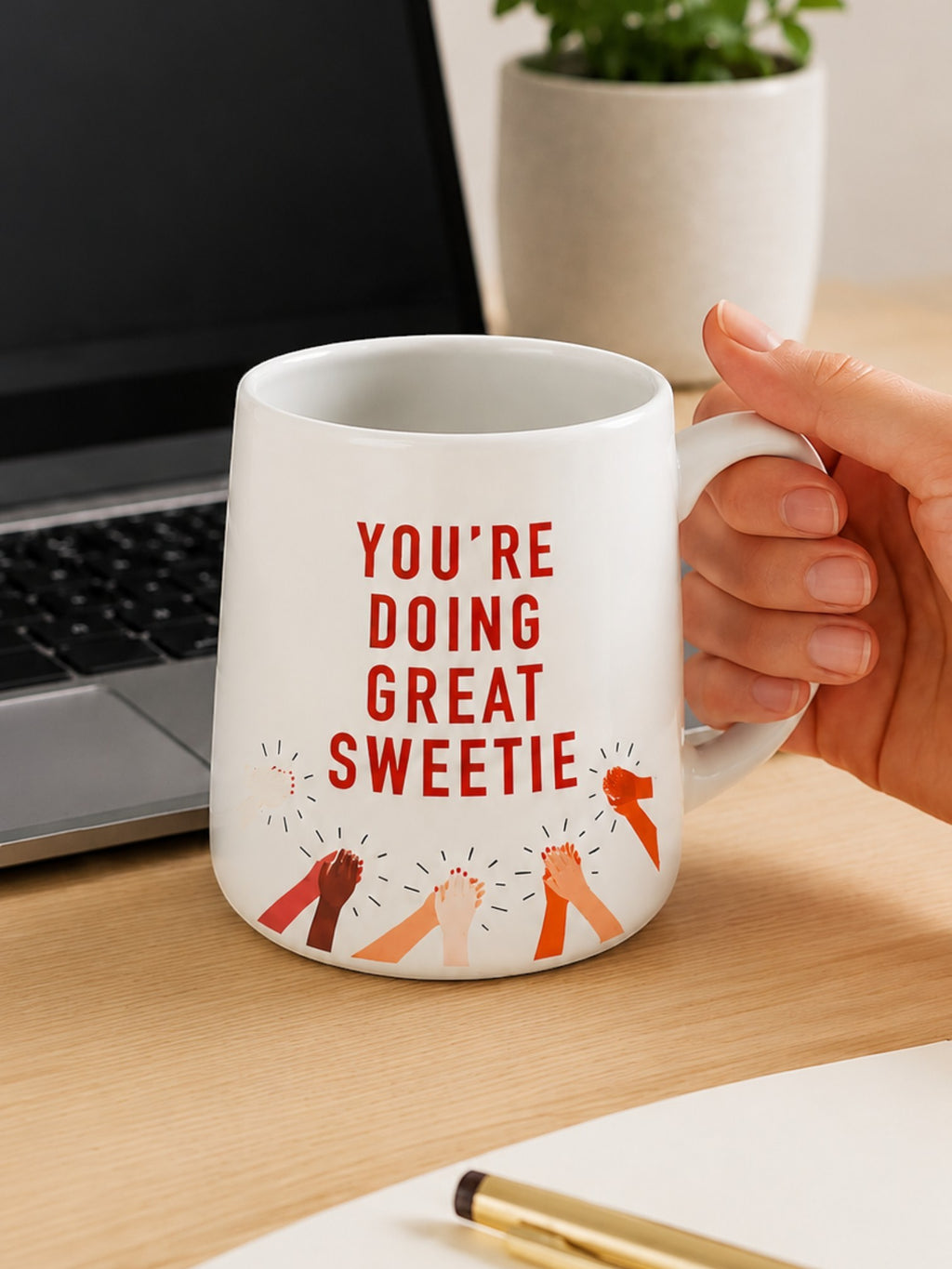 Tap2Own ceramic coffee mug featuring You're Doing Great Sweetie text and inclusive clapping hands illustration.