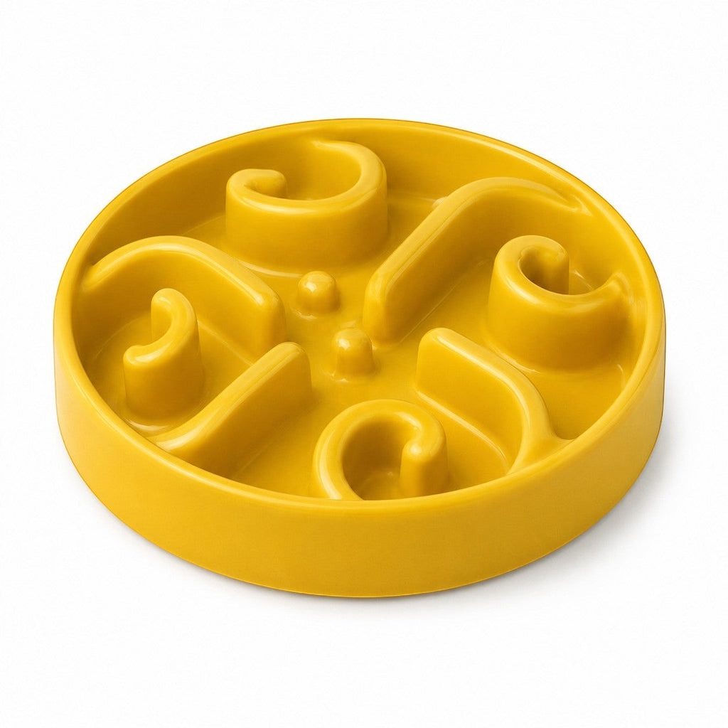 Tap2Own yellow interactive slow feeder dog bowl with maze design to promote healthy eating and digestion.