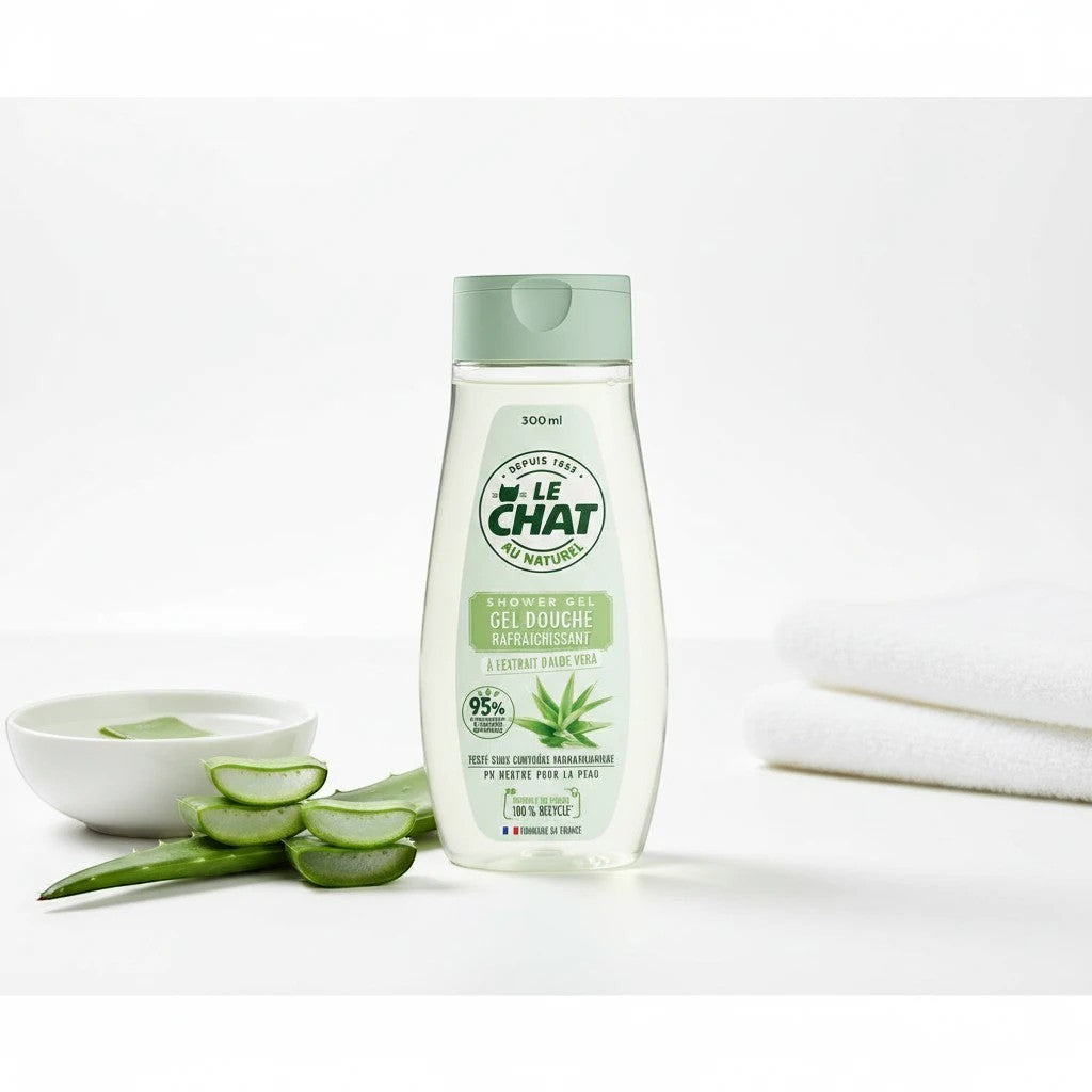 Tap2Own Le Chat Au Naturel Aloe Vera shower gel in a 300ml recycled plastic bottle with fresh aloe slices.