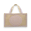 Tap2Own Mandala beach tote bag in natural jute with lavender mandala print and pom-pom trim.