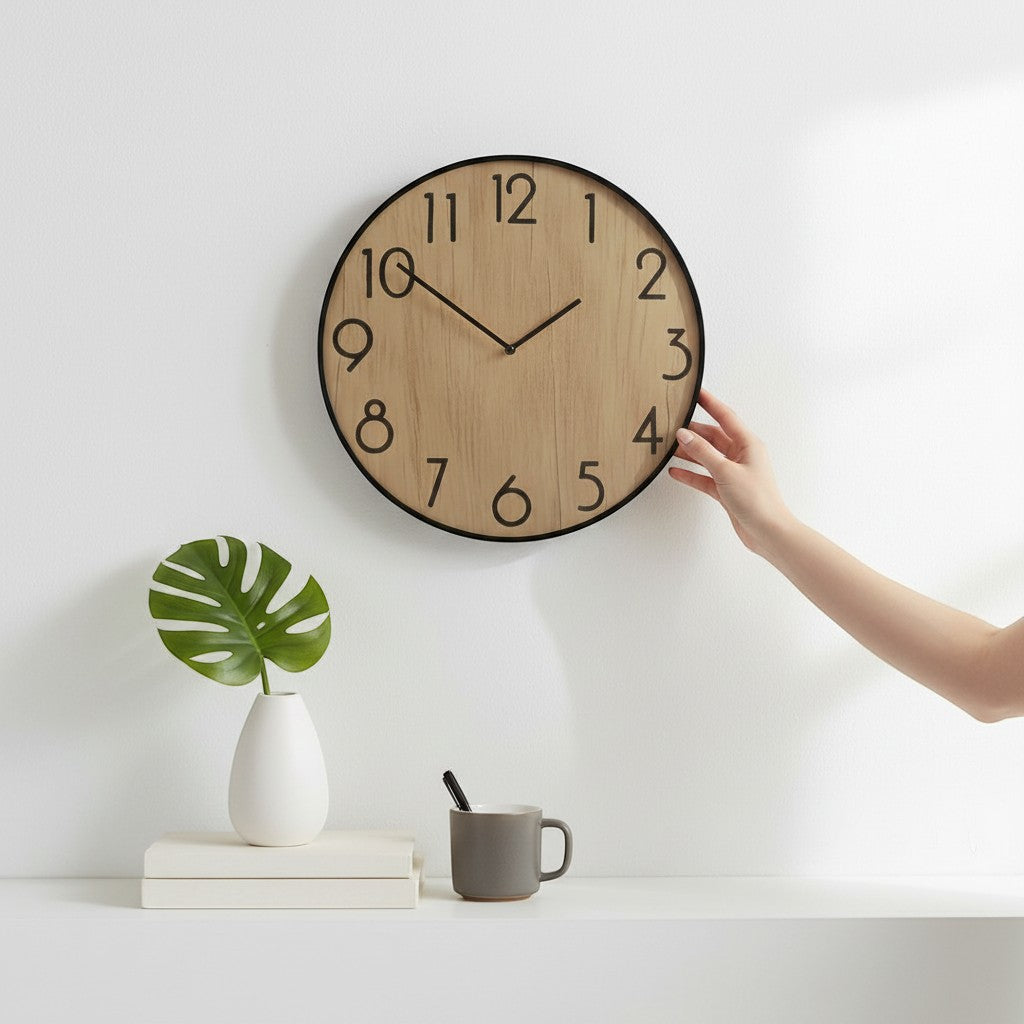 Tap2Own Modern wooden wall clock with black frame and natural wood grain face. Large black numerals on a light wood background.