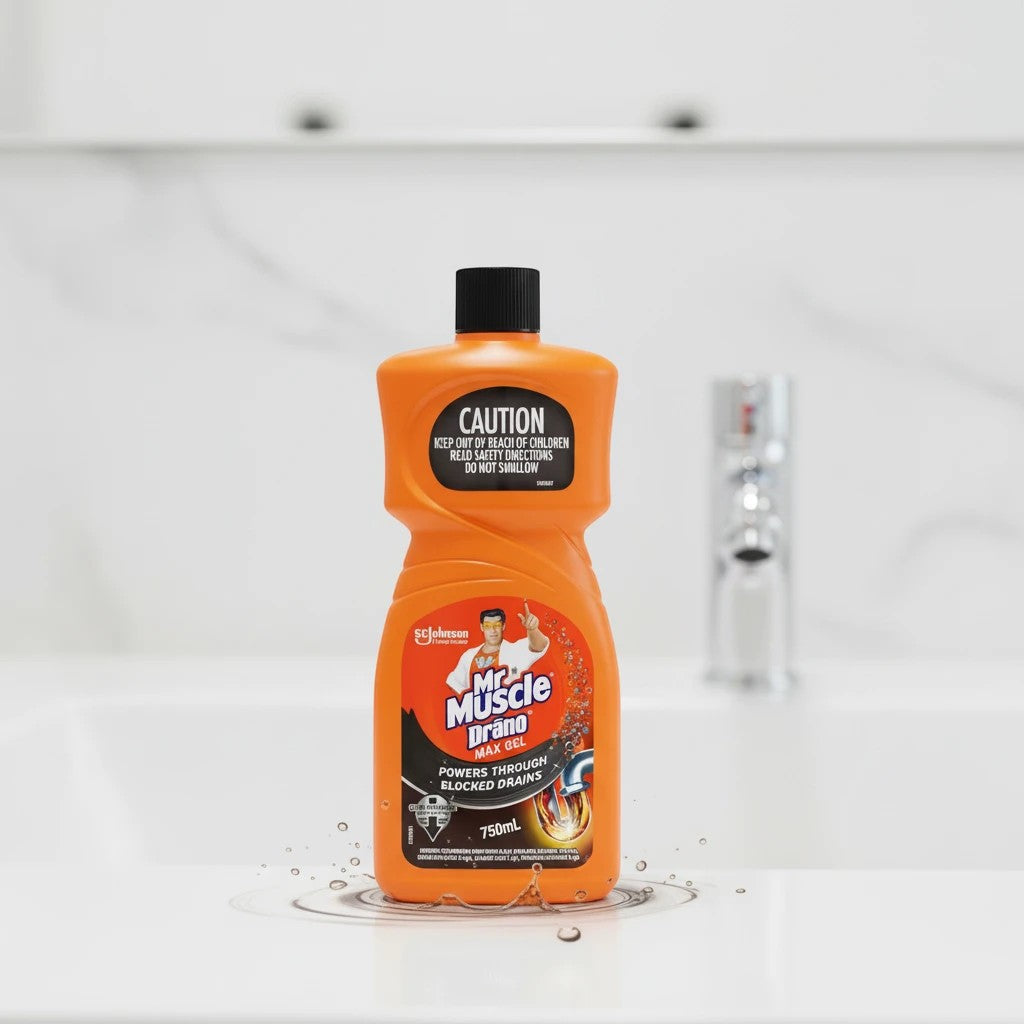 Tap2Own Mr Muscle Drano Max Gel drain cleaner bottle in an orange plastic container on a bathroom sink.