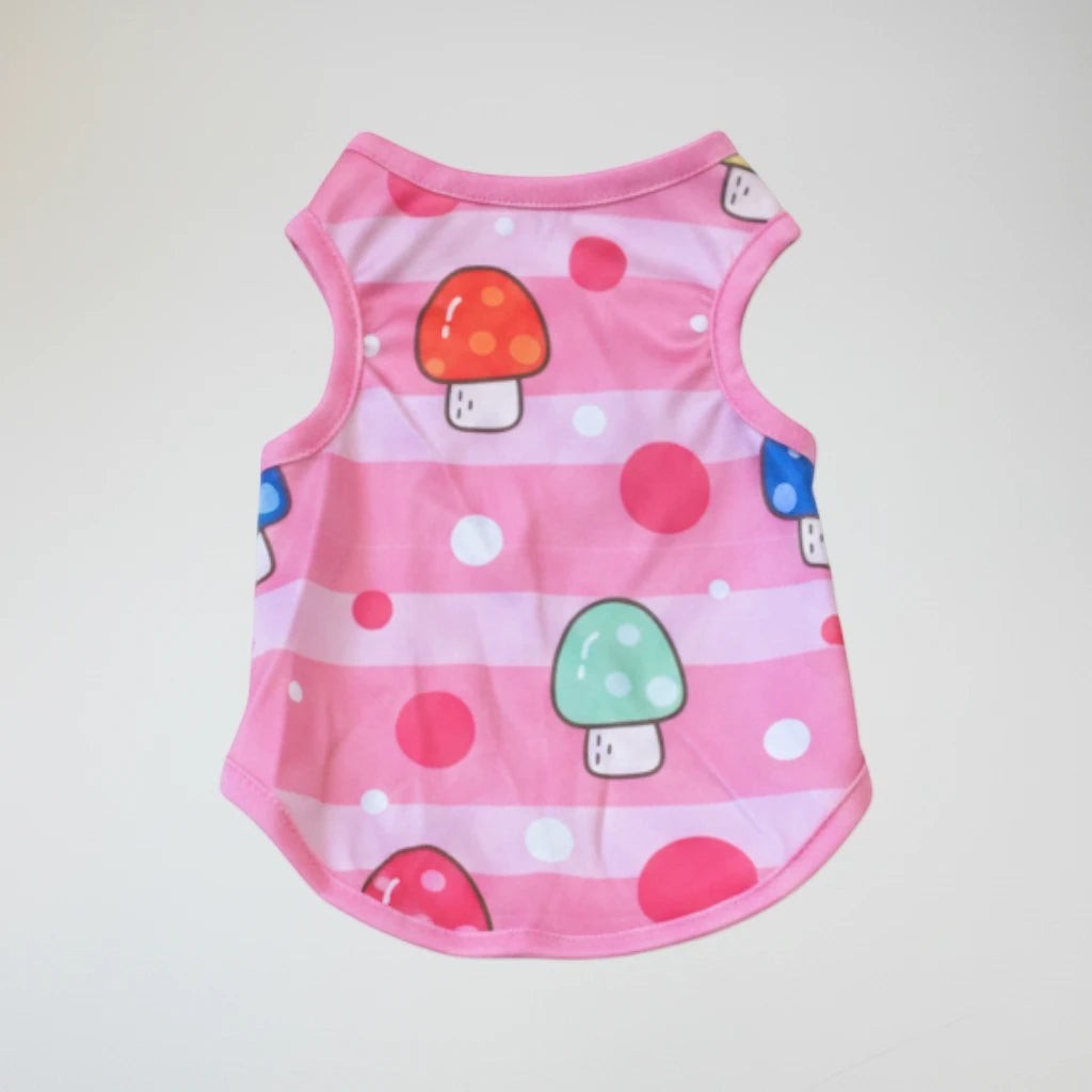 Tap2Own pink pet tank top with mushroom print, polka dots, and stripes. Sleeveless design for comfort.