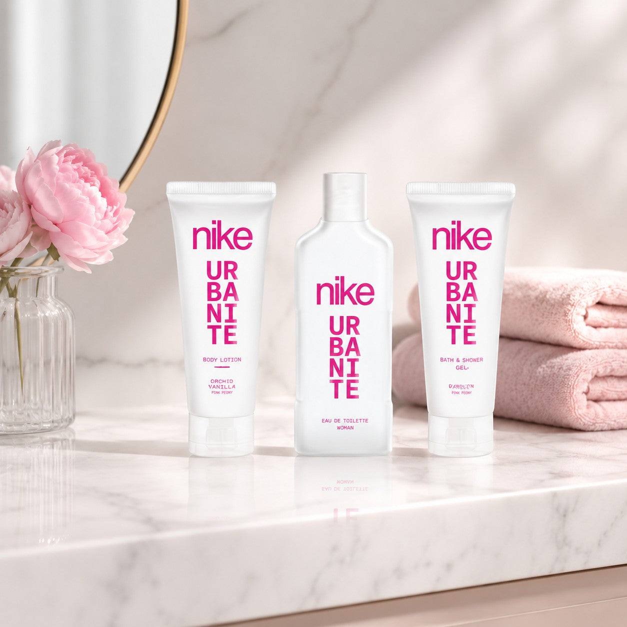 Tap2Own Nike Urbanite Oriental Avenue fragrance set featuring body lotion, eau de toilette, and shower gel on marble.