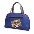 Tap2Own blue pet carrier tote bag with red trim and a cool bulldog graphic wearing sunglasses and headphones.