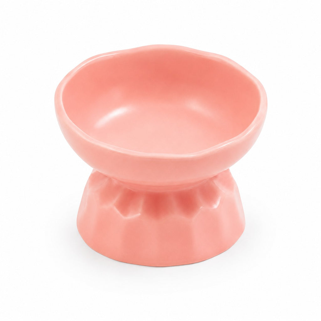 Tap2Own pink ceramic pet food bowl with raised base for healthier eating posture and stability.