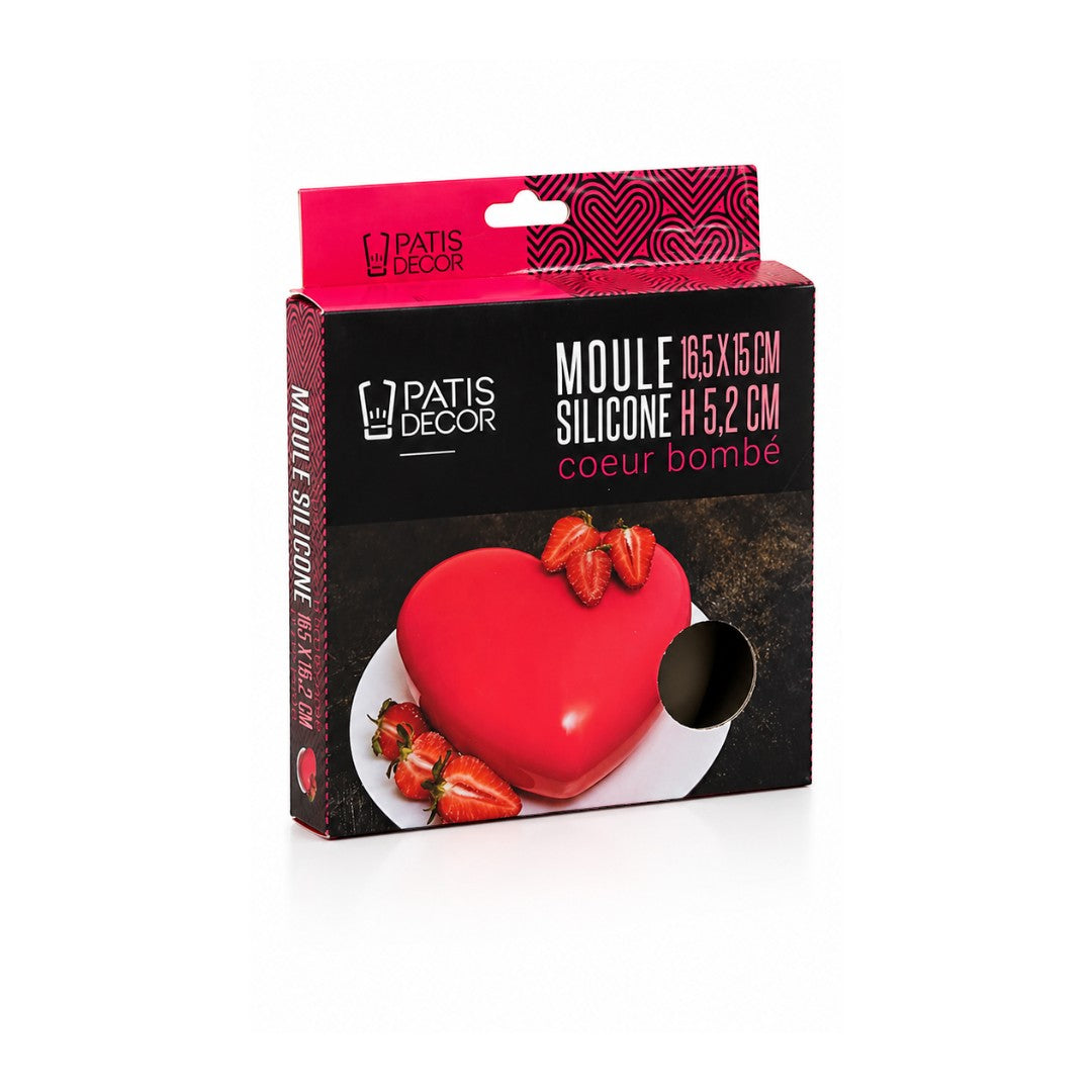 Tap2Own red silicone heart-shaped baking mold with strawberries on a white plate.