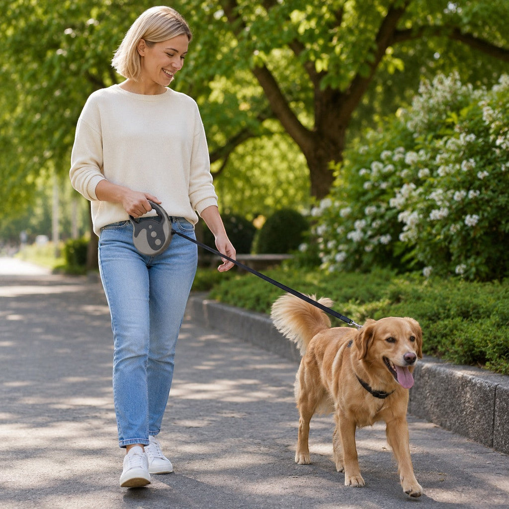 Tap2Own Automatic Retractable Dog Leash in blue and black, with ergonomic handle, for medium dogs up to 20kg.