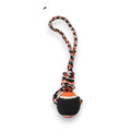 Tap2Own dog rope ball tug toy with orange, black, and white braided rope handle and a black ball with orange trim.