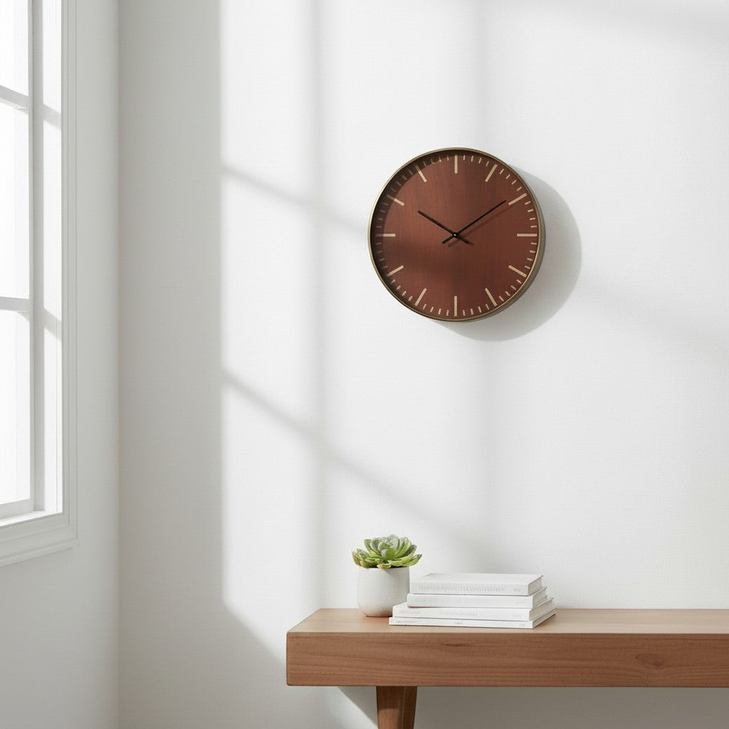 Tap2Own round wall clock with a dark brown wood face, gold bezel, and minimalist hour markers.