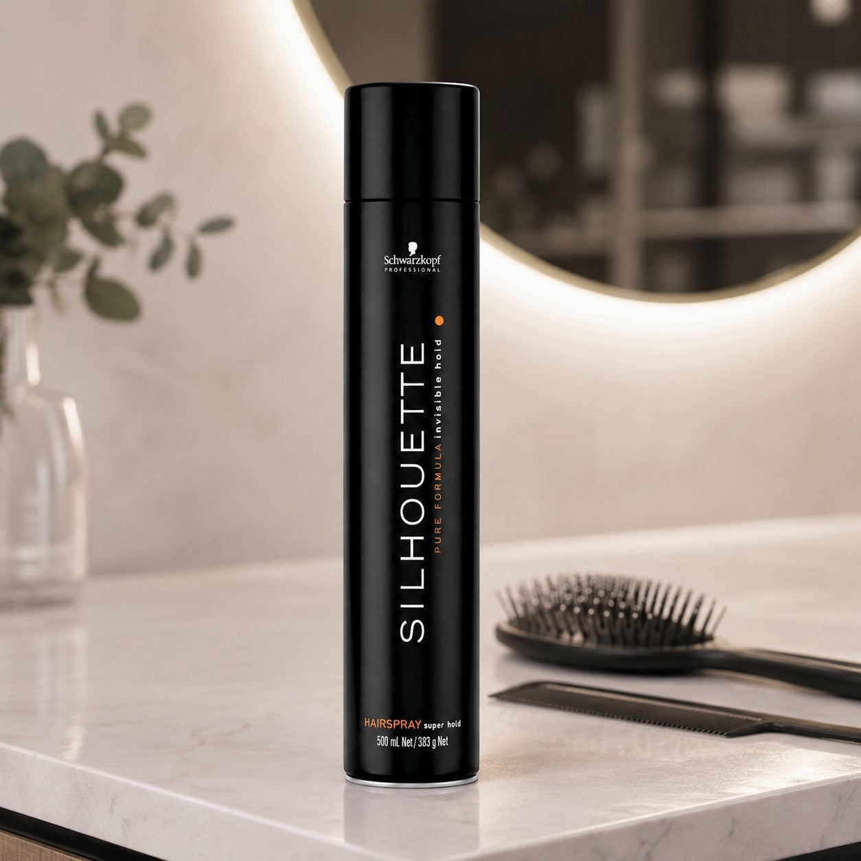 Tap2Own Schwarzkopf Professional Silhouette Super Hold Hairspray 500ml canister on a bathroom vanity with hair tools.