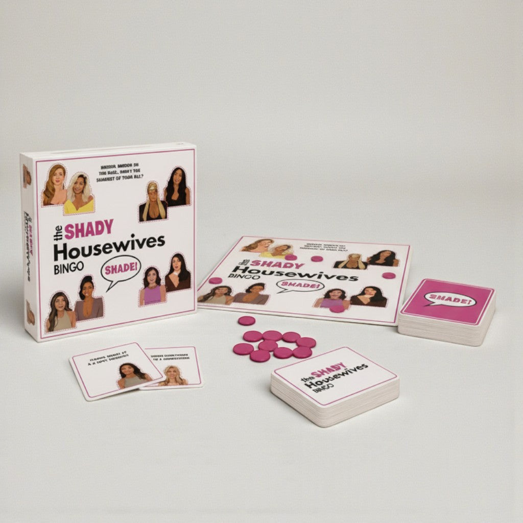 The Shady Housewives Bingo Party Game box, cards, and tokens. Features illustrations of housewives and pink bingo chips.