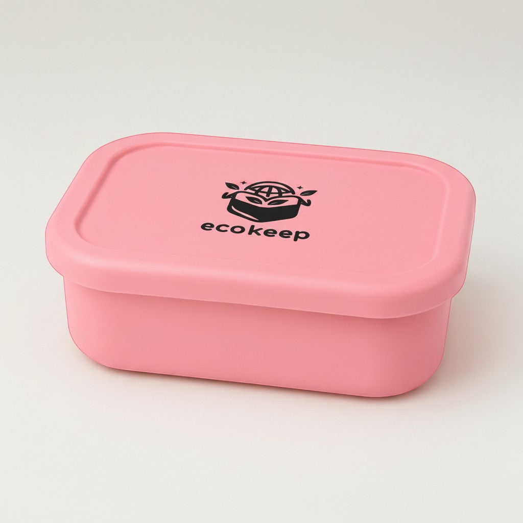 Tap2Own pink silicone bento lunch box with multiple compartments and secure lid.