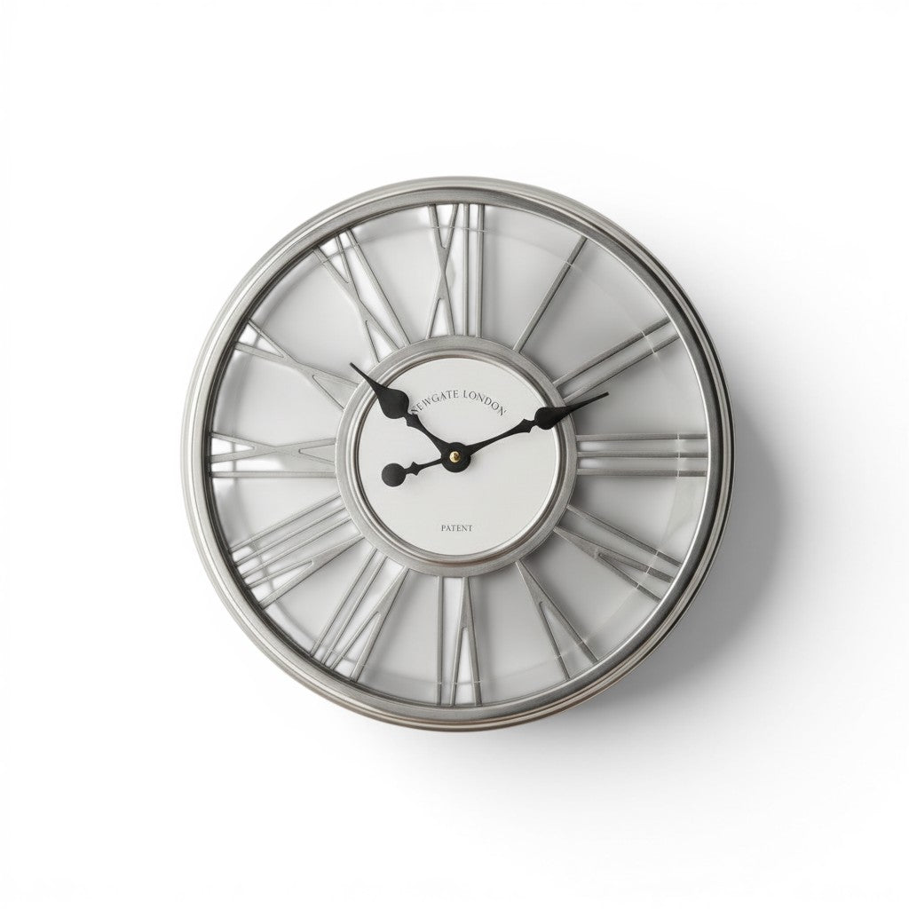 Tap2Own silver Roman numeral wall clock with open-heart detailing and black hands.