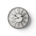 Tap2Own silver Roman numeral wall clock with open-heart detailing and black hands.