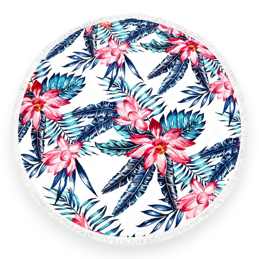 Tap2Own round beach towel with pink hibiscus flowers and blue palm leaves on white, fringed edge.